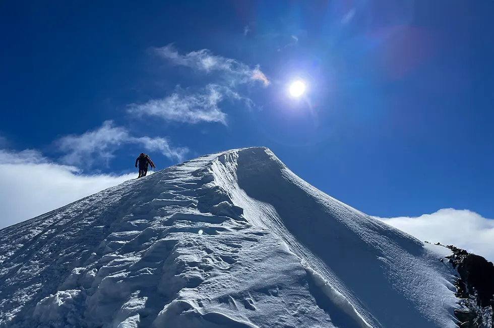 Climbing to a 4,000-meter summit in the Swiss Alps